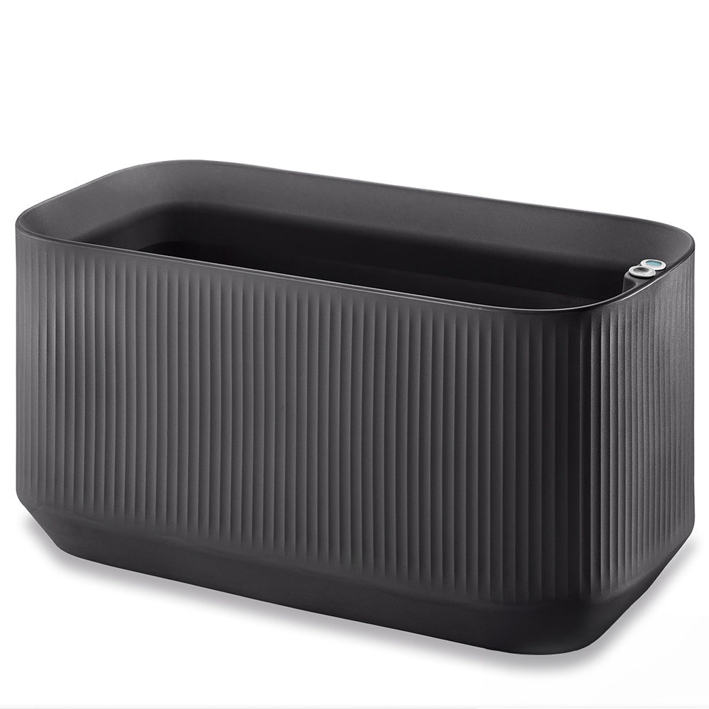 Black rectangular planter with ribbed texture on a white background